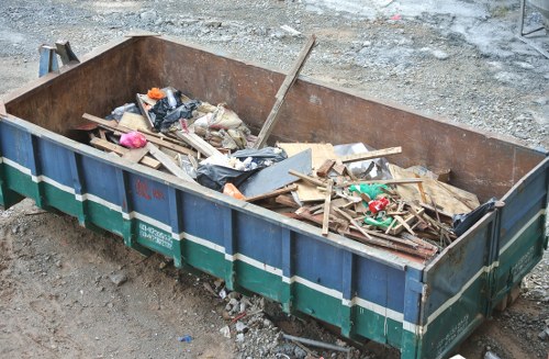 Crew sorting office furniture into recycling streams in Kenton